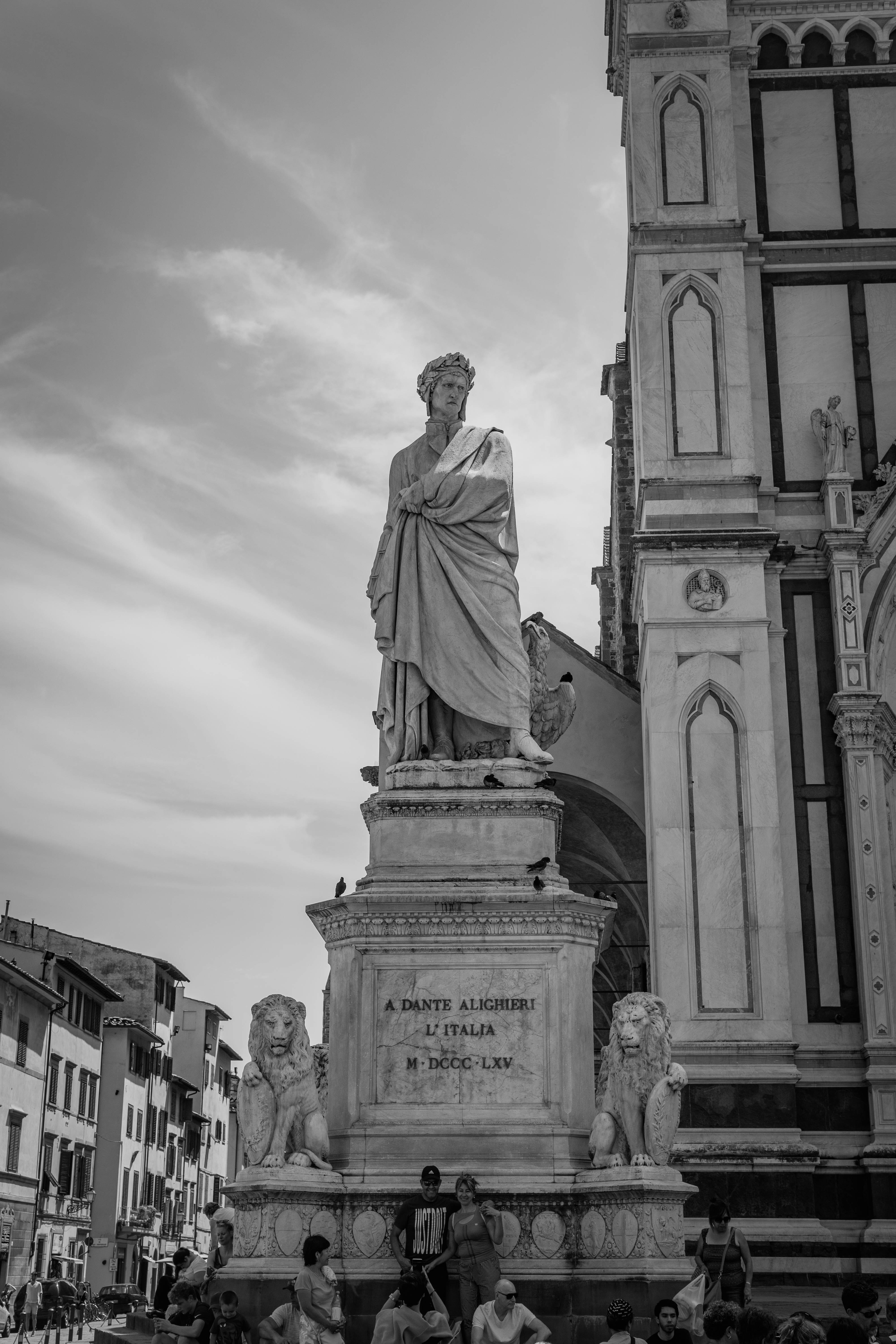 grayscale photo of man sculpture